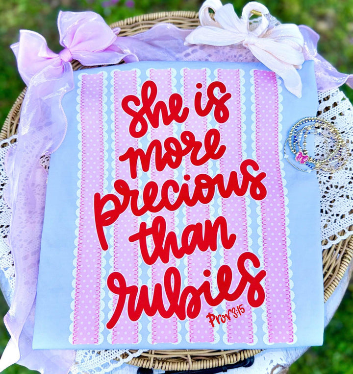SHE IS MORE PRECIOUS THAN RUBIES