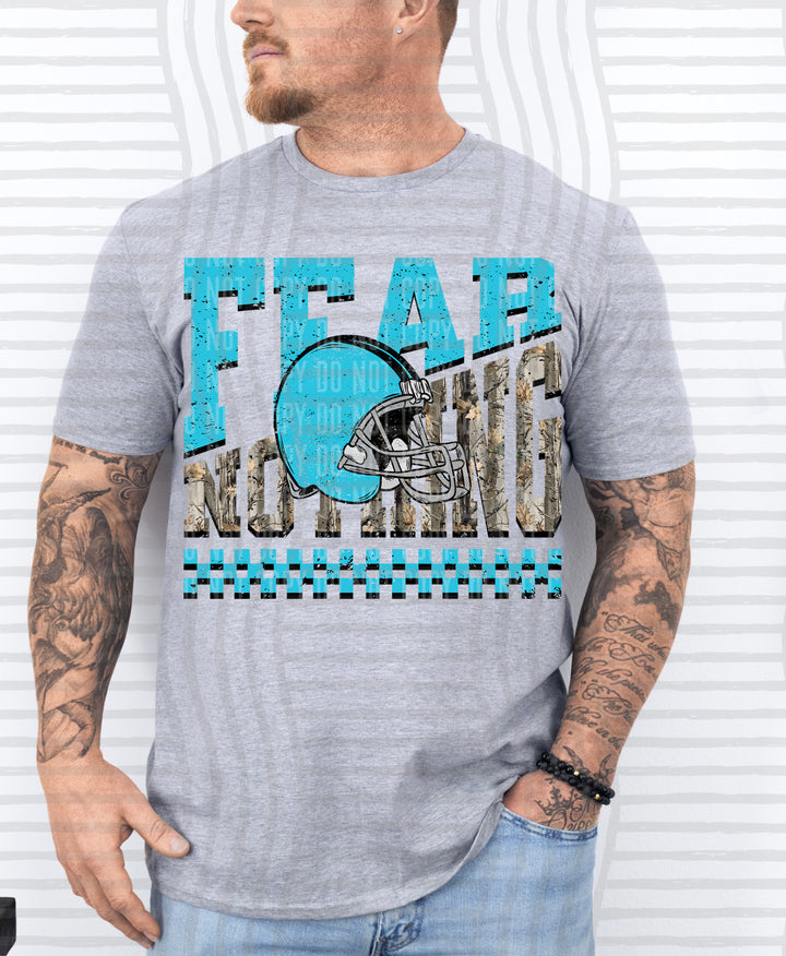 Bright Blue Fear Nothing Helmet DTF transfer pressed on a tee
