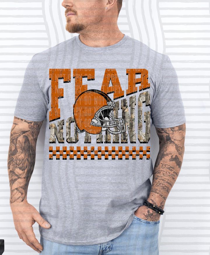 Burnt Orange Fear Nothing Helmet DTF transfer pressed on a tee