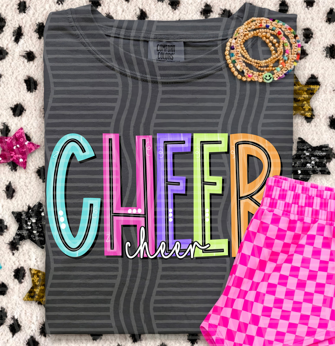 Cheer Game Day Doodles DTF transfer pressed on a tee