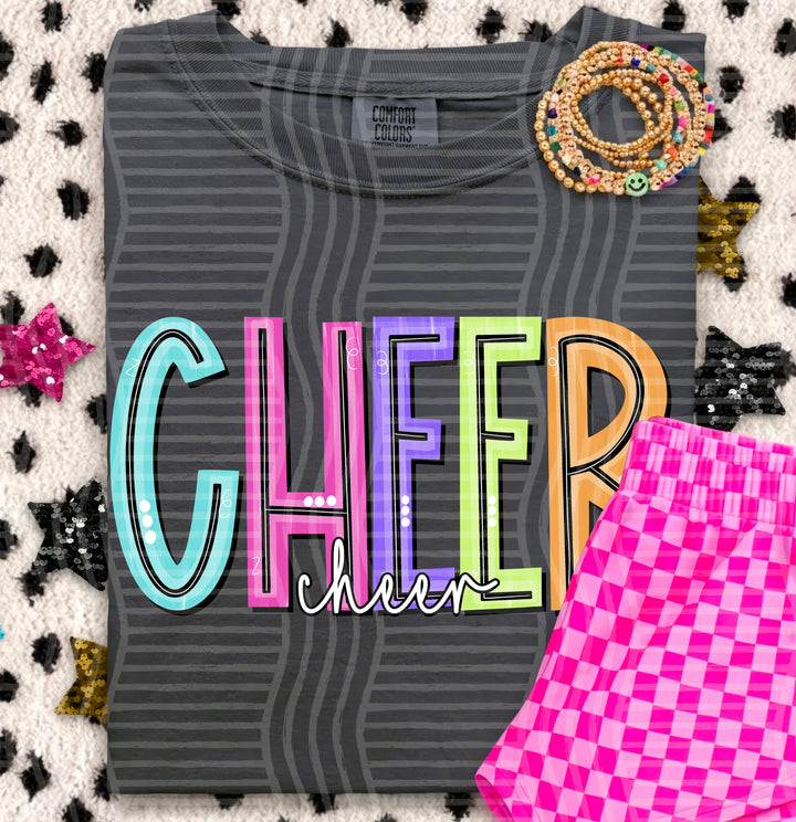 Cheer Game Day Doodles DTF transfer pressed on a tee