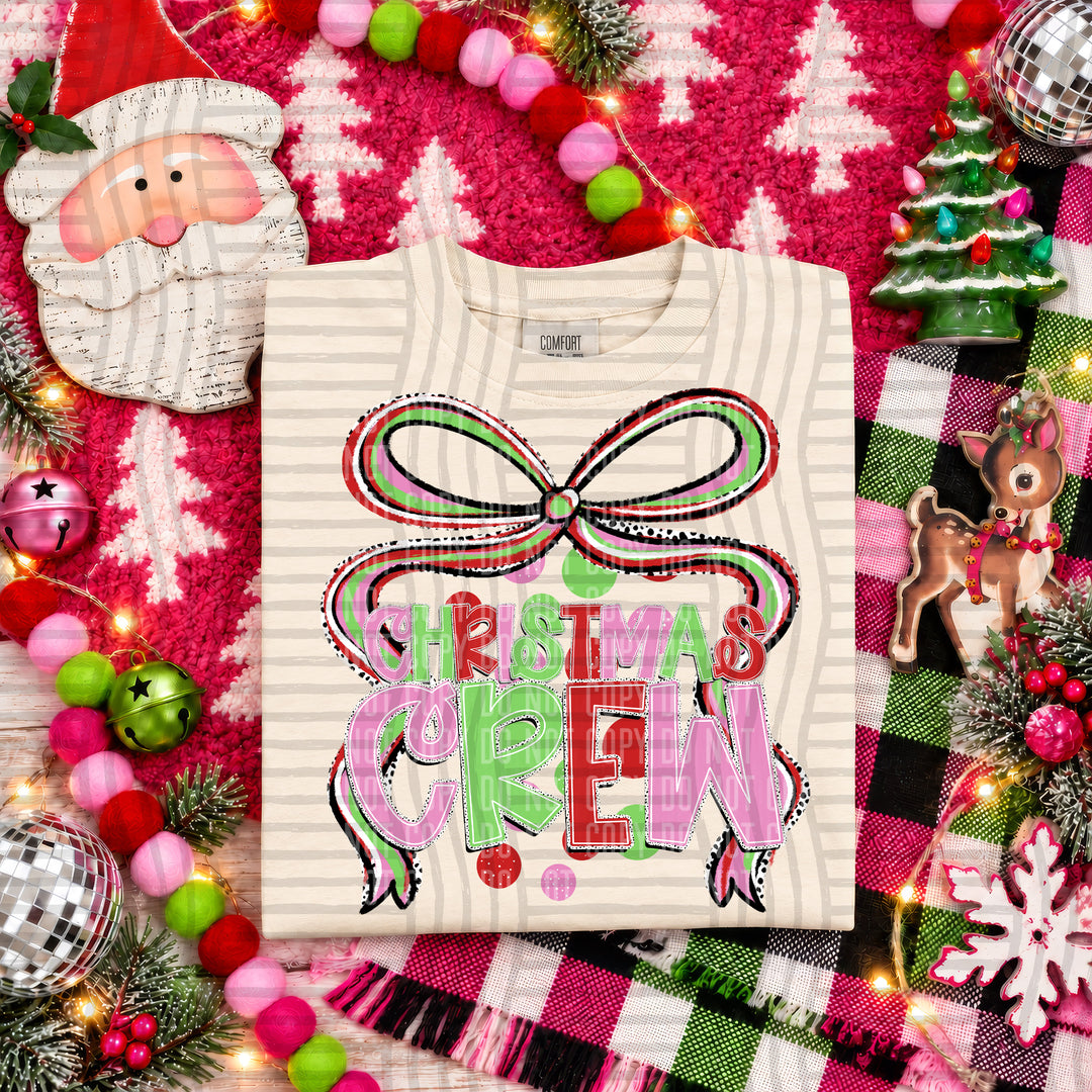Christmas Crew Christmas Bow DTF transfer pressed on a tee