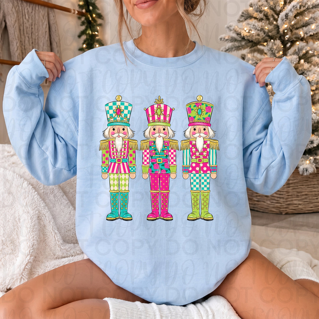 Colorful Christmas Nutcrackers Christmas DTF transfer shown on a shirt