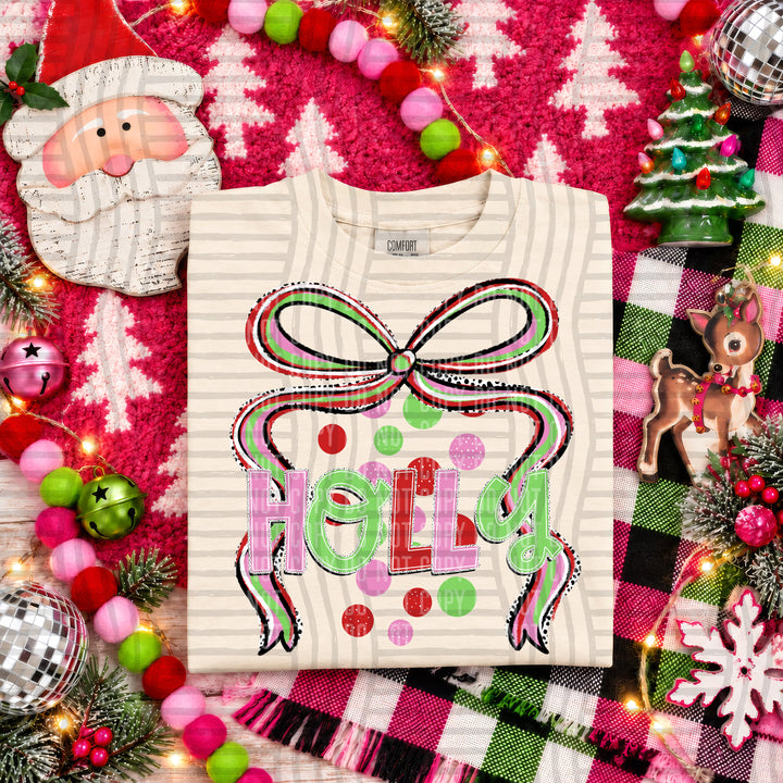 Holly Christmas Bow DTF transfer pressed on a tee