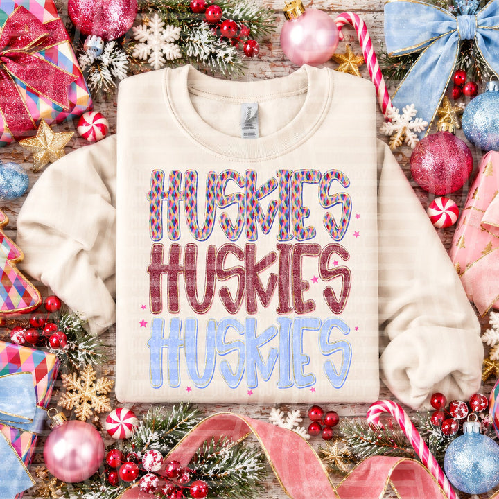 Huskies Jingle Jumble Stacked Mascots DTF transfer