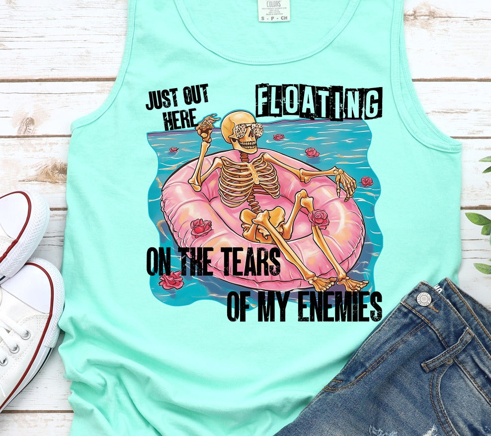 JUST OUT HERE FLOATING ON THE TEARS OF MY ENEMIES