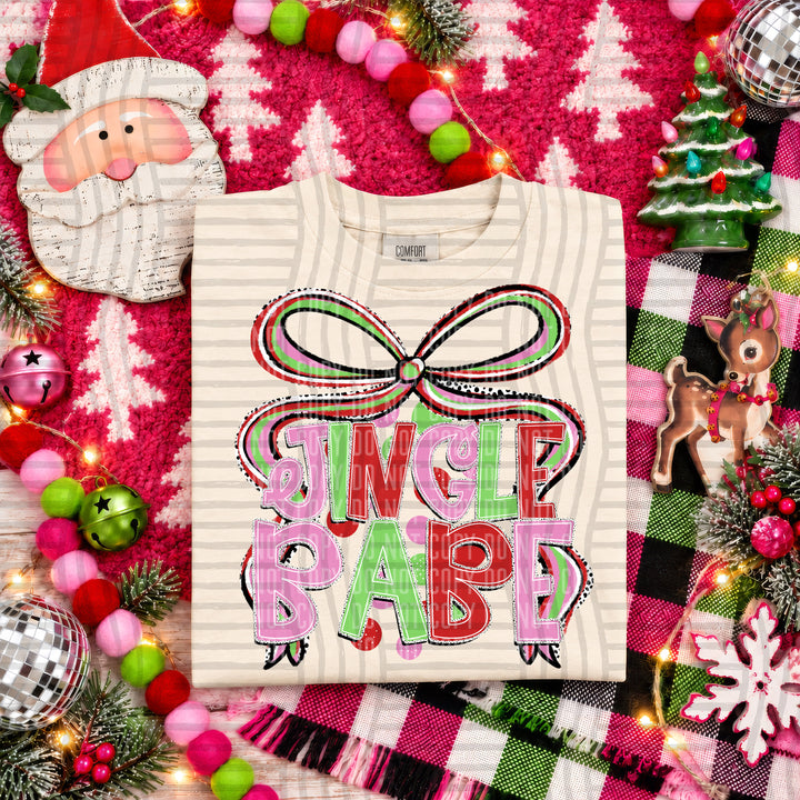 Jingle Babe Christmas Bow DTF transfer pressed on a tee