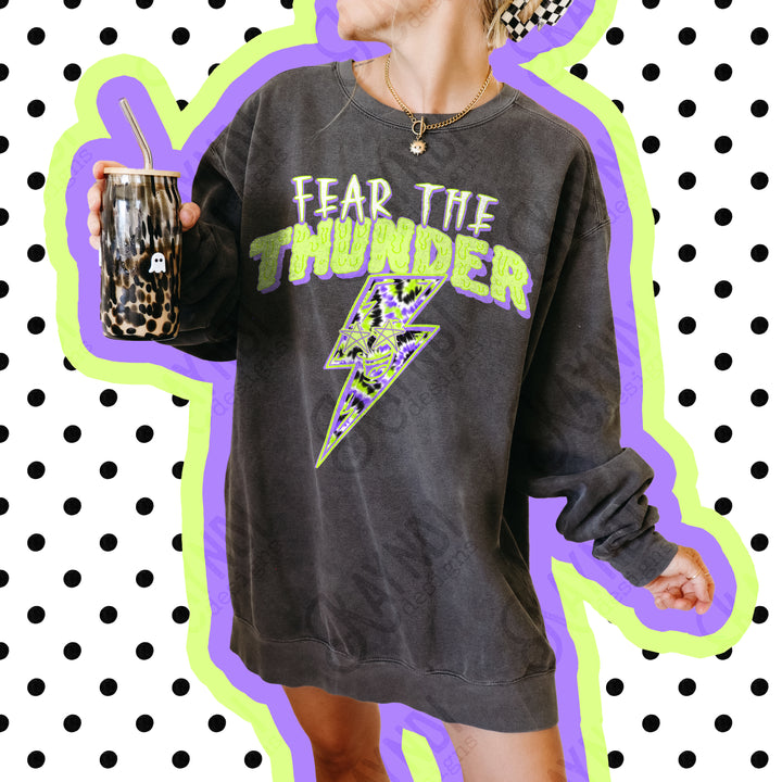 Fear the Thunder DTF transfer pressed on a pepper Comfort Colors tee