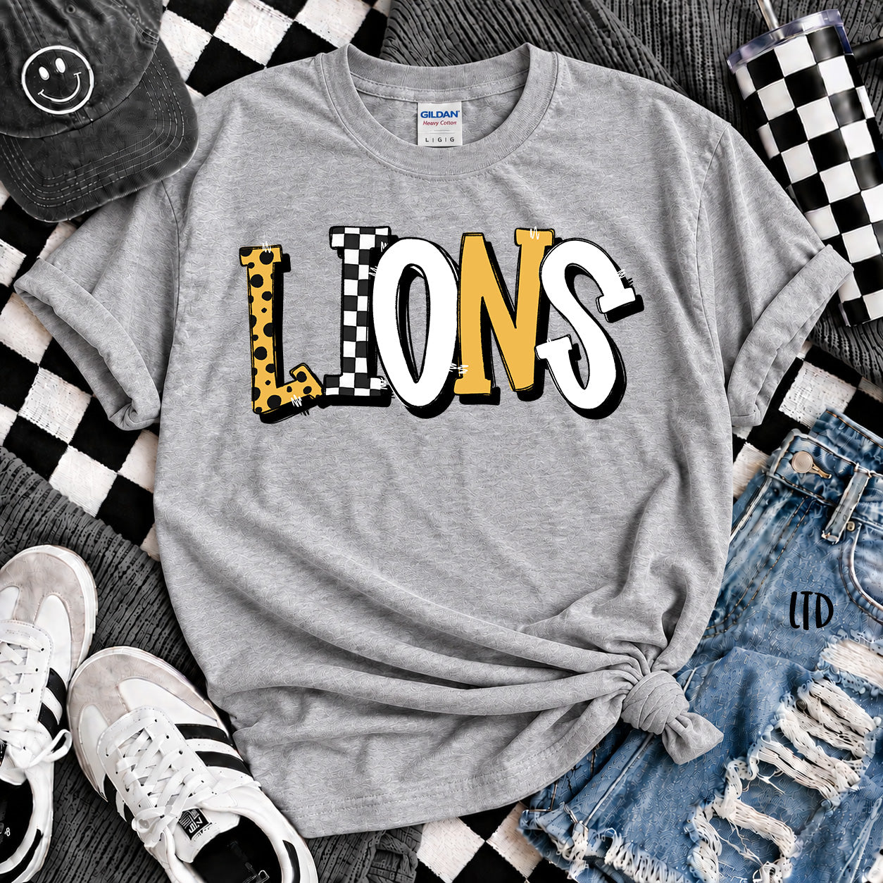 Dot Dot Check Mix Mascots Lions Black Yellow Gold design