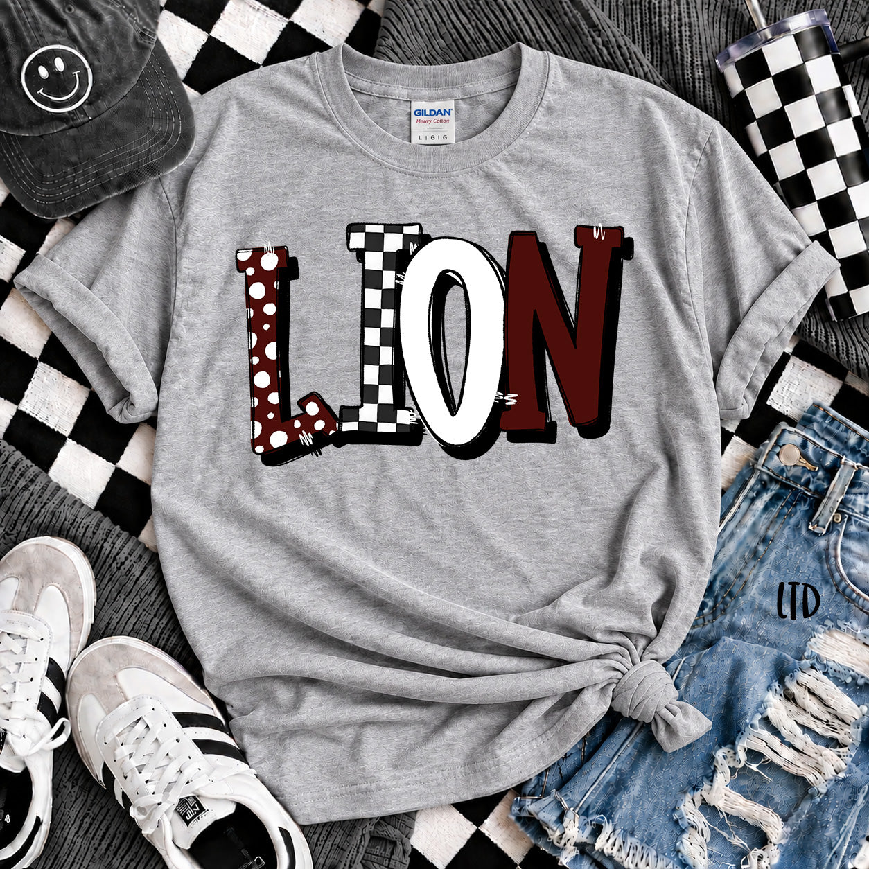 Dot Dot Check Mix Mascots Lion Maroon White design