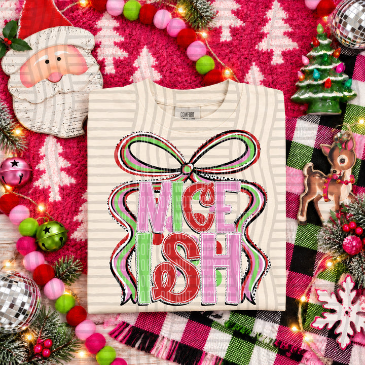 Nice-ish Christmas Bow DTF transfer pressed on a tee