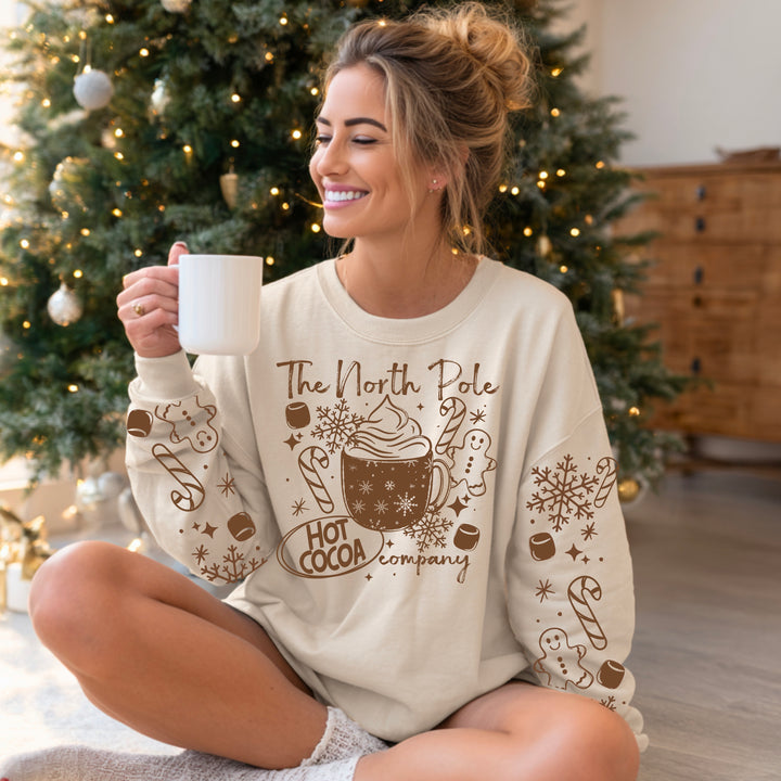 The North Pole Hot Cocoa Company (Brown) front and sleeve DTF transfers – mockup