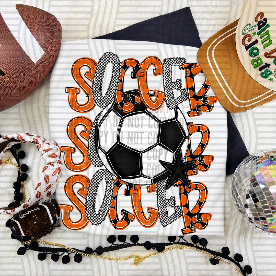 Orange Tri Stacked Soccer DTF transfer on a white tee