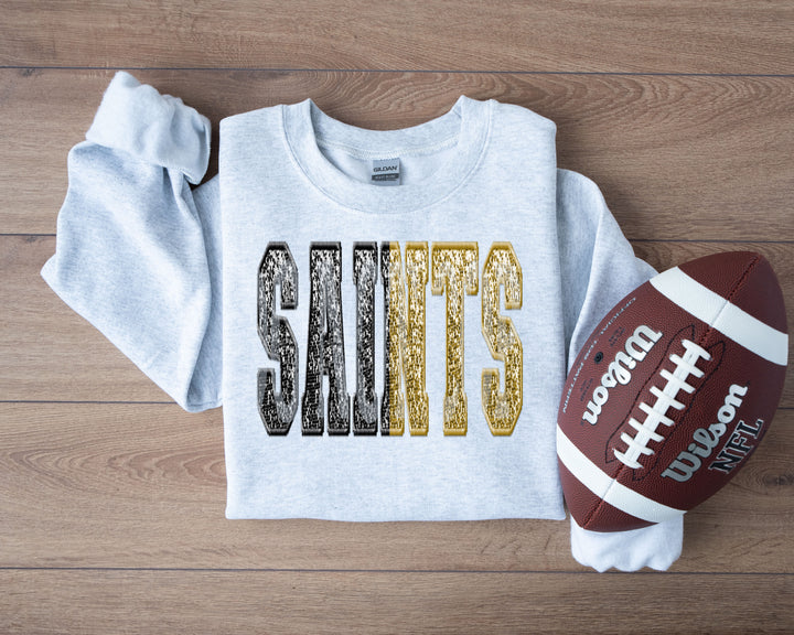 SAINTS SPLIT SEQUIN BLACK AND GOLD
