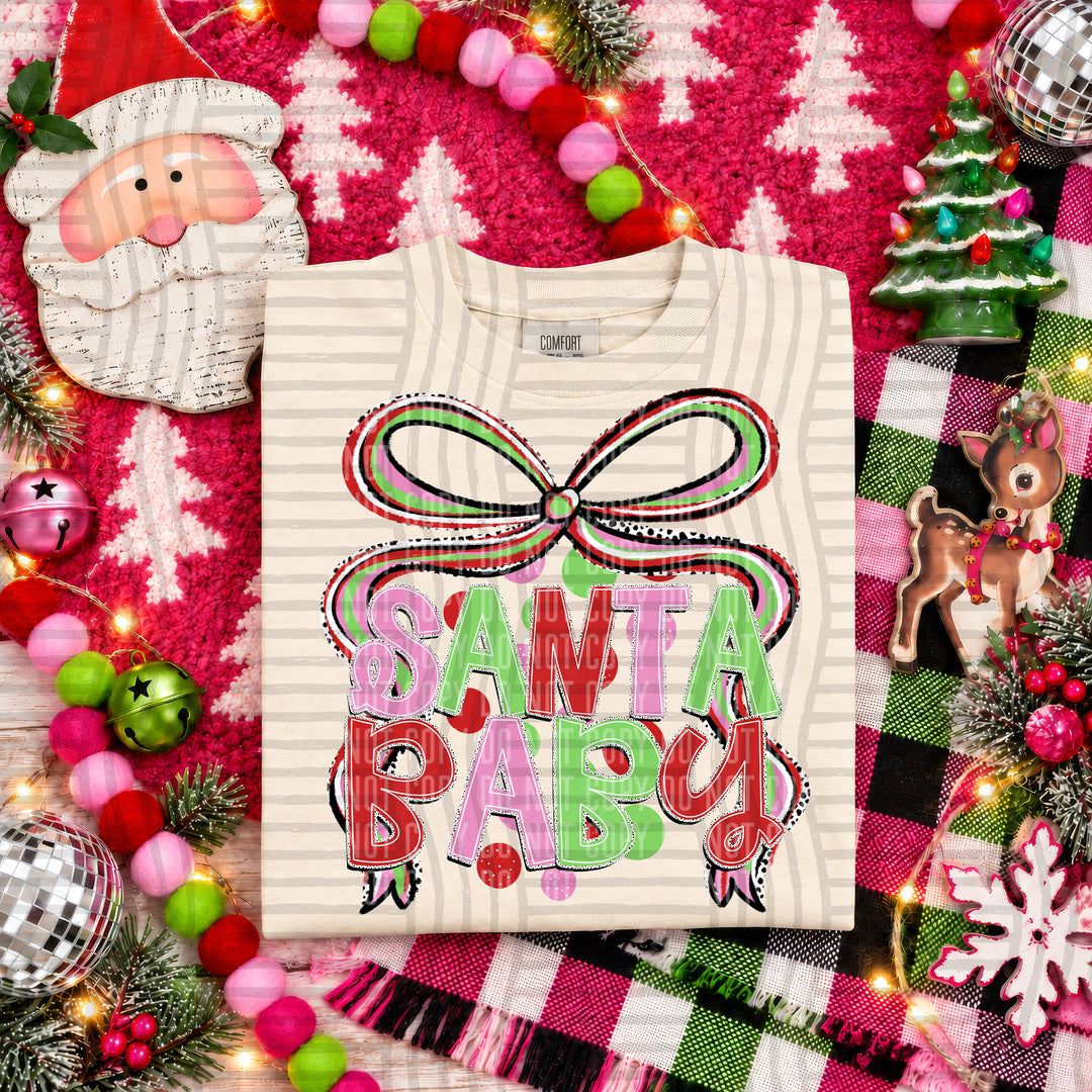 Santa Baby Christmas Bow DTF transfer pressed on a tee