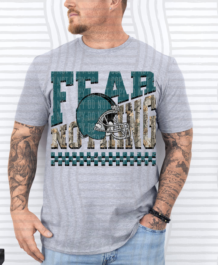 Teal Fear Nothing Helmet DTF transfer pressed on a tee