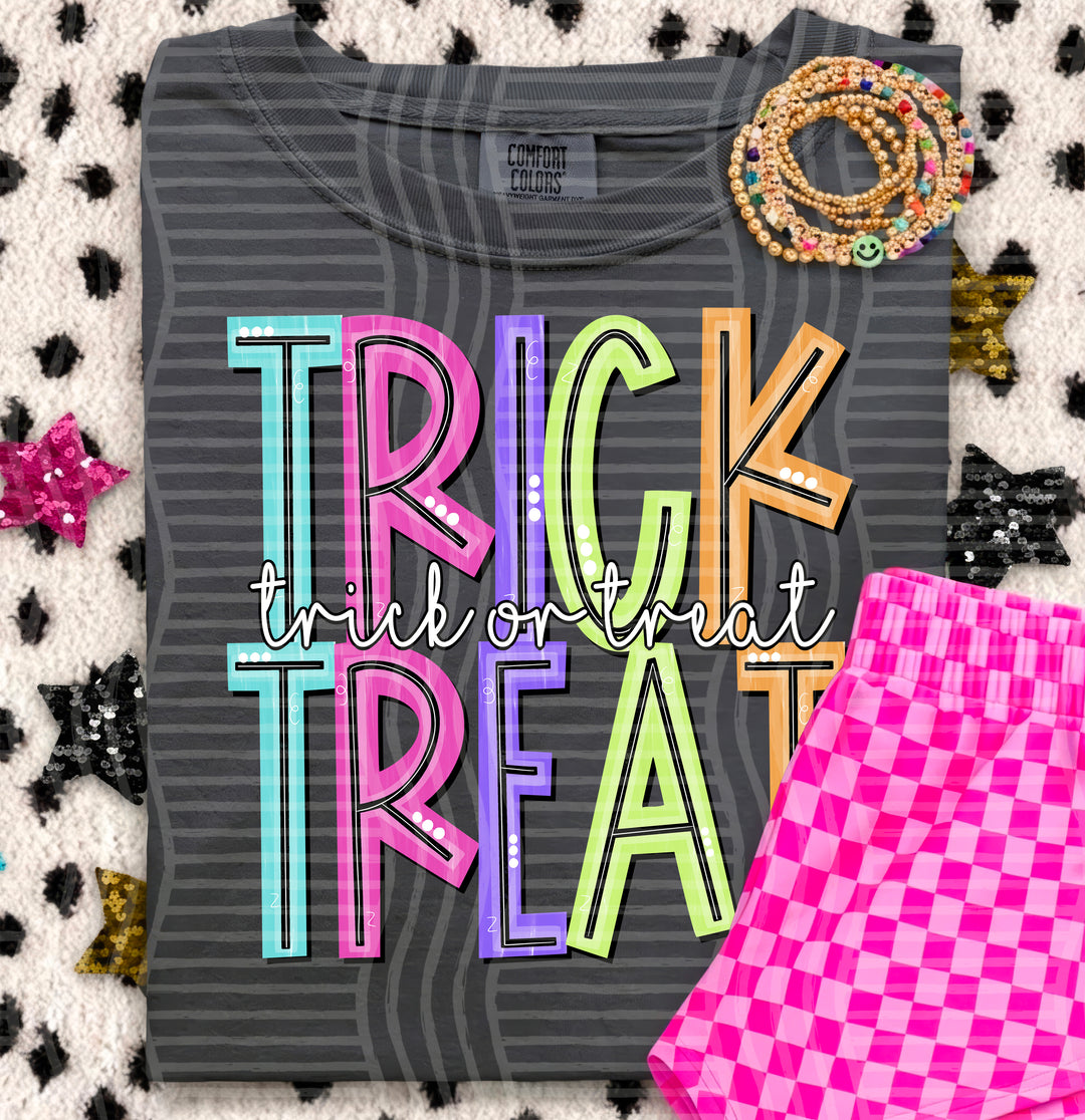 Trick or Treat Game Day Doodles DTF transfer pressed on a tee