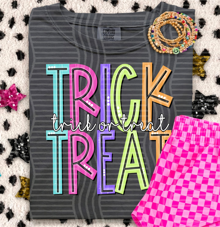 Trick or Treat Game Day Doodles DTF transfer pressed on a tee