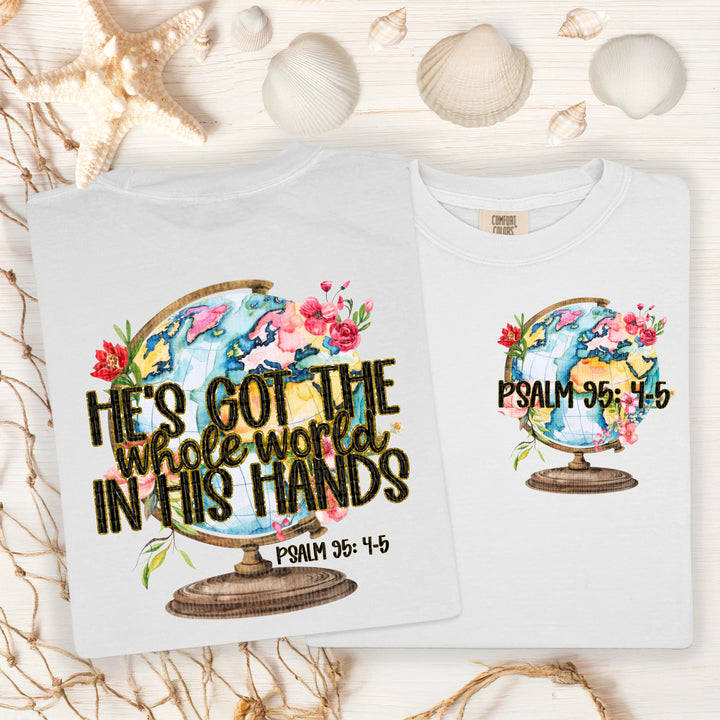 WHOLE WORLD IN HIS HANDS