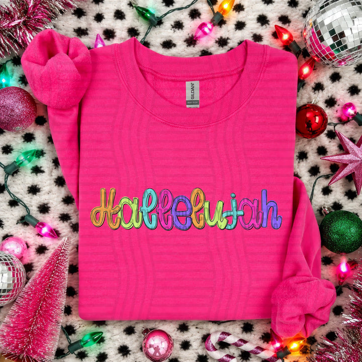 Hallelujah Script Christmas DTF transfer shown on a pink sweater