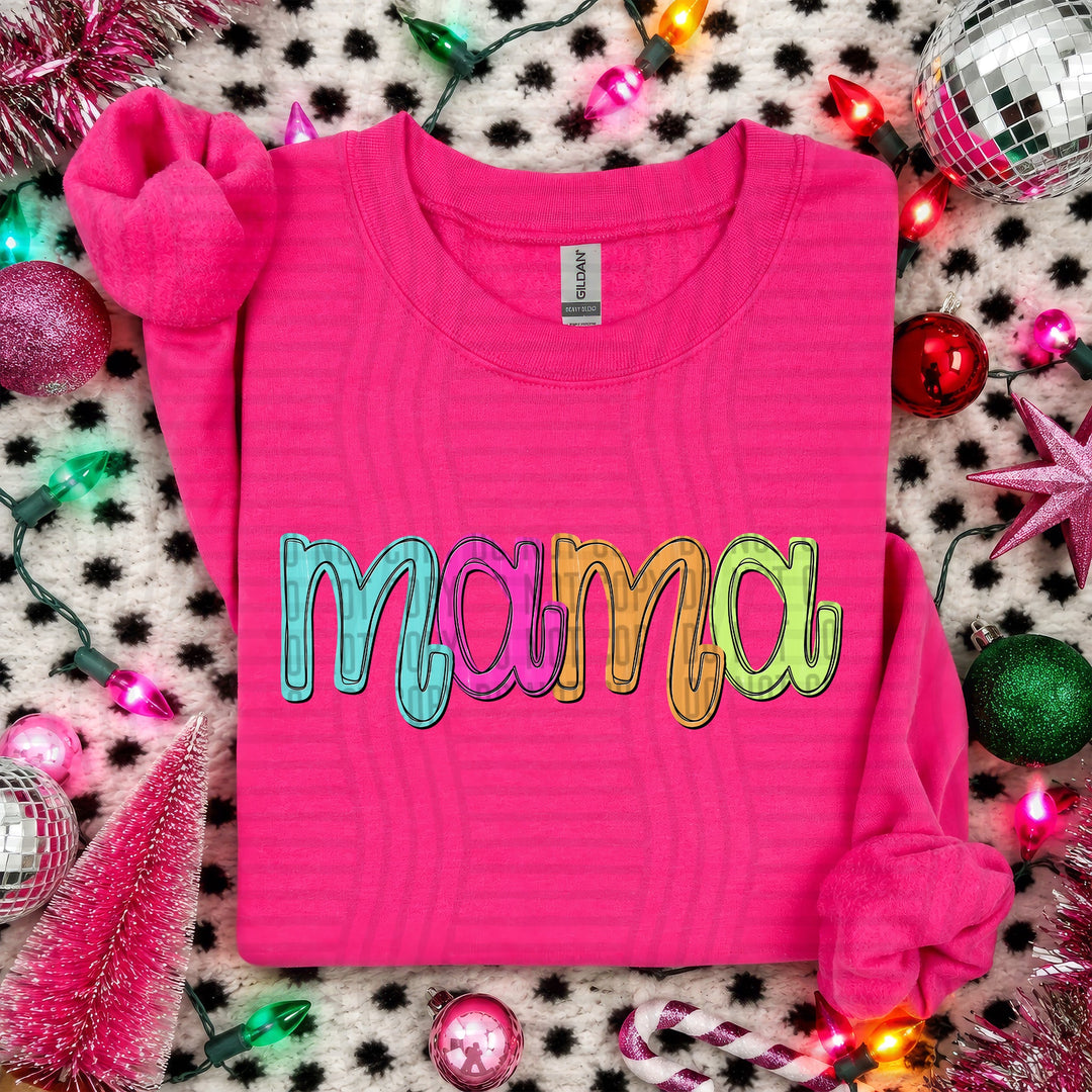Mama Script Christmas DTF transfer shown on a pink sweater