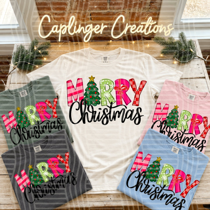 Merry Christmas Doodles DTF transfer pressed on a tee