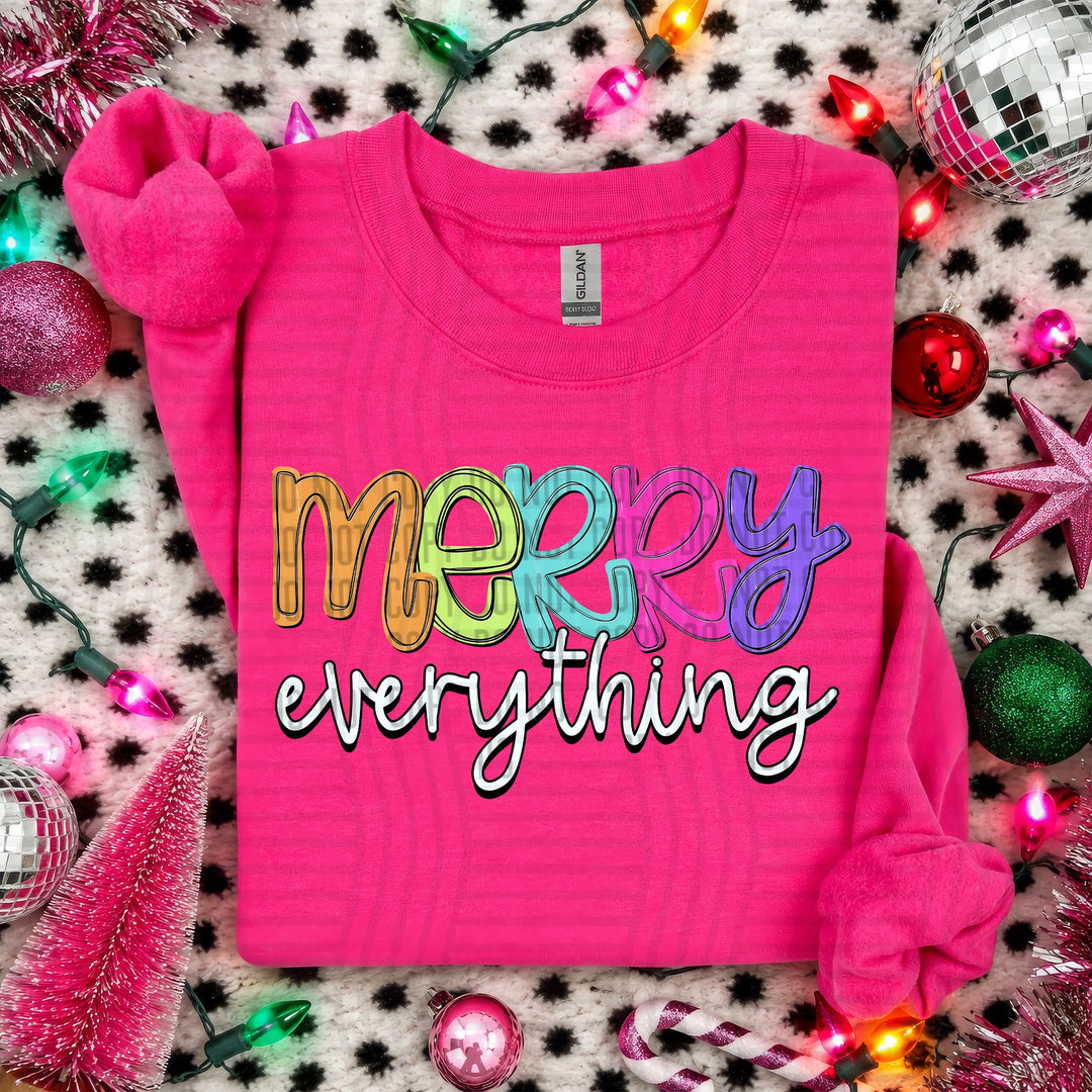 Merry Everything Script Christmas DTF transfer shown on a pink sweater