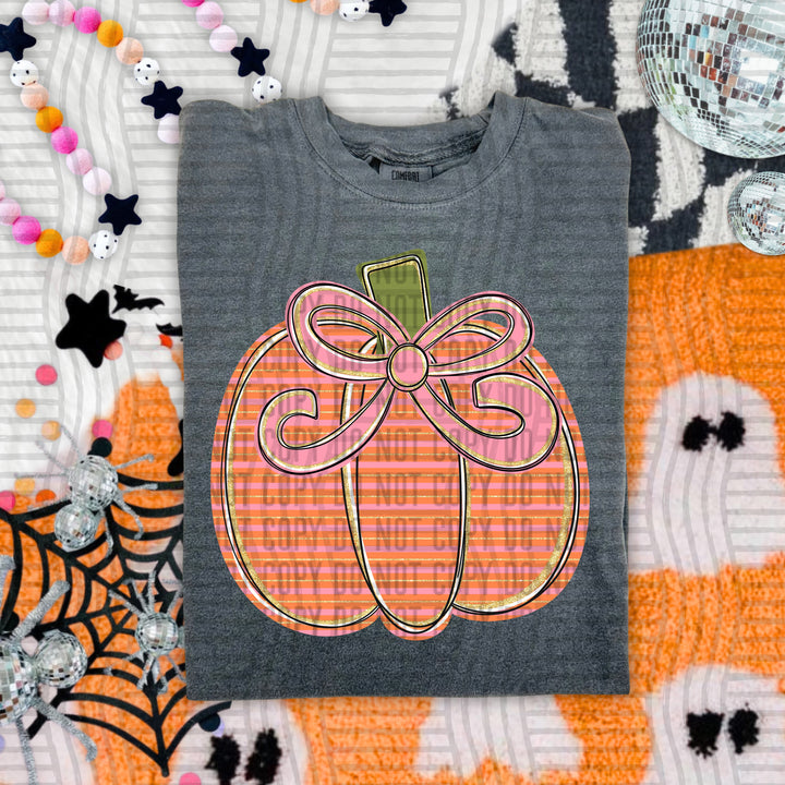 Pink Glitter Pumpkin DTF transfer pressed on a tee