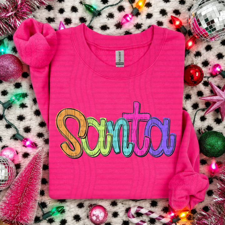 Santa Script Christmas DTF transfer shown on a pink sweater