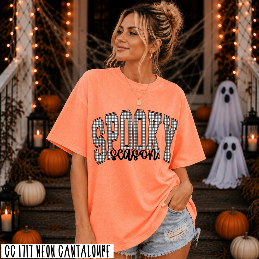 Spooky Season gingham design on a neon cantaloupe Comfort Colors tee