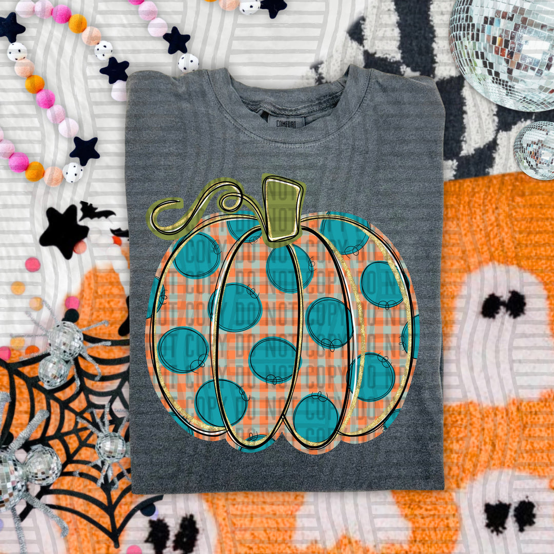 Teal Dots Pumpkin DTF transfer pressed on a tee
