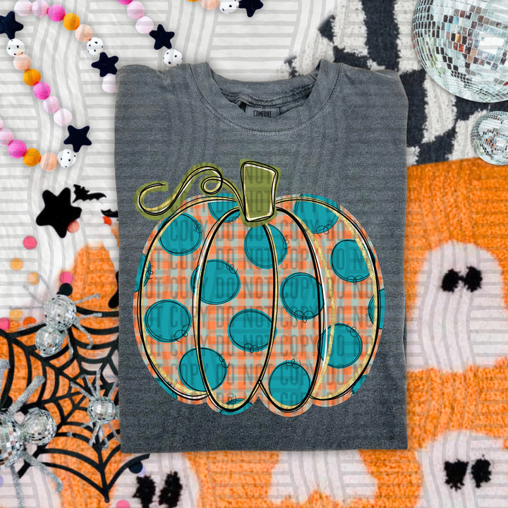 Teal Dots Pumpkin DTF transfer pressed on a tee