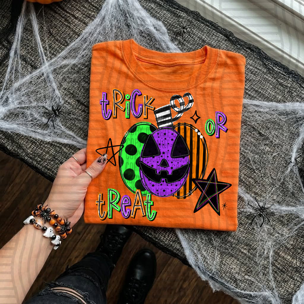 Trick Or Treat DTF transfer pressed on a tee
